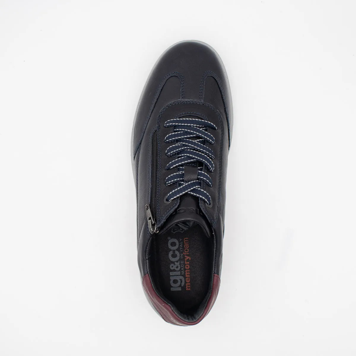 Black sneaker with visible brand logo on a white background