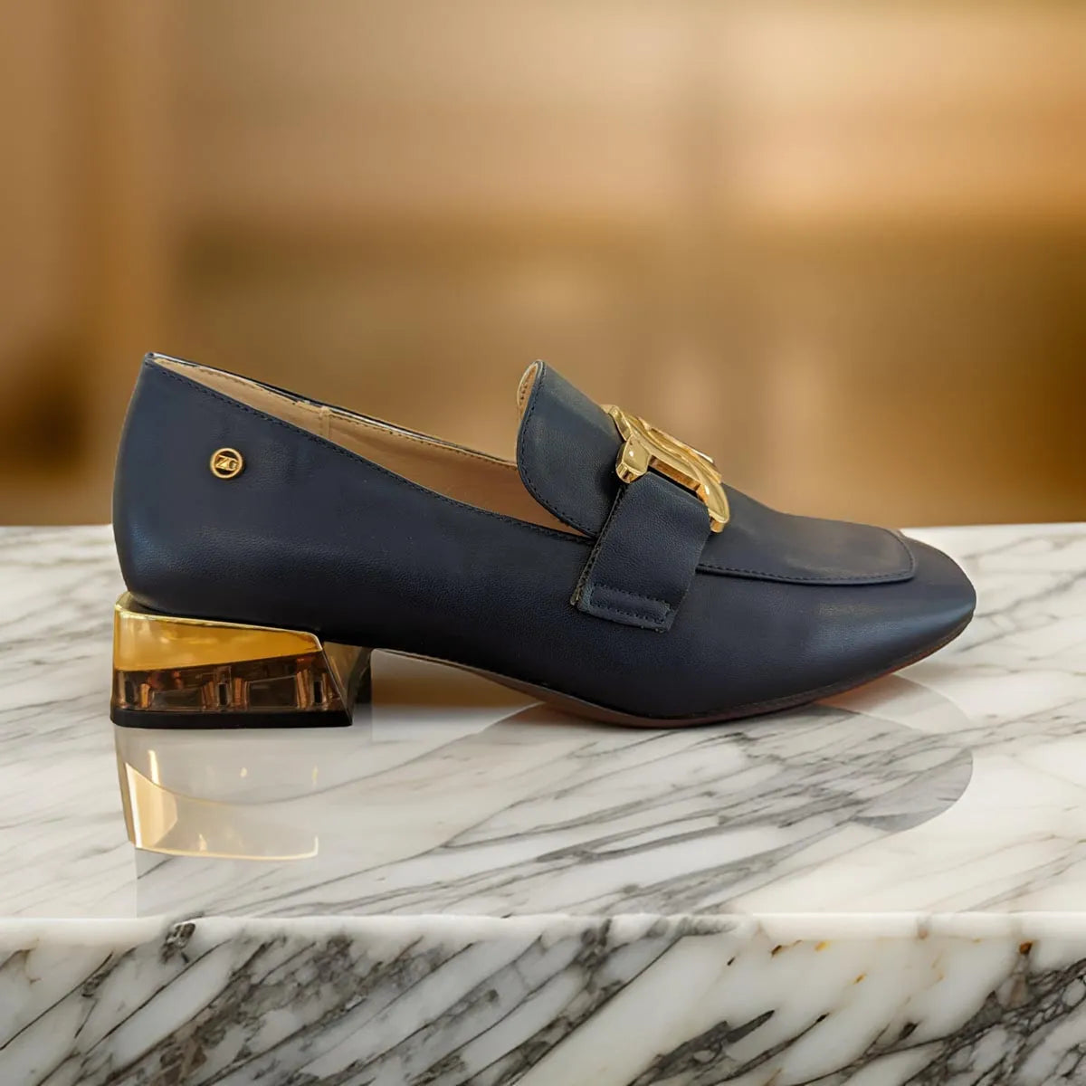 Chic Zanni Co Navy Loafers with Gold Chain and Elegant Heel Design Leavys Shoes