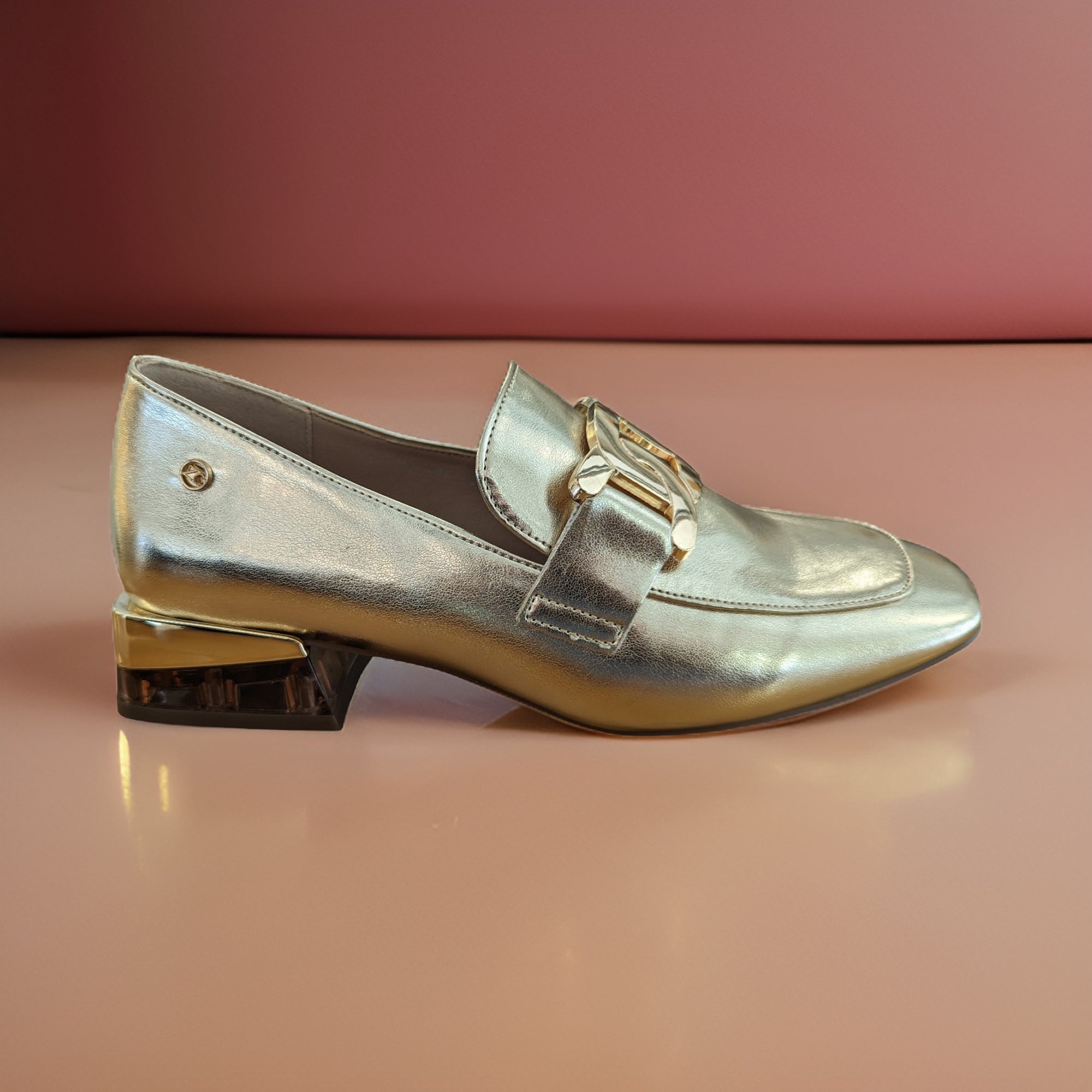     Front view of Zanni & Co Cream Square Toe Loafer with gold chain link.
