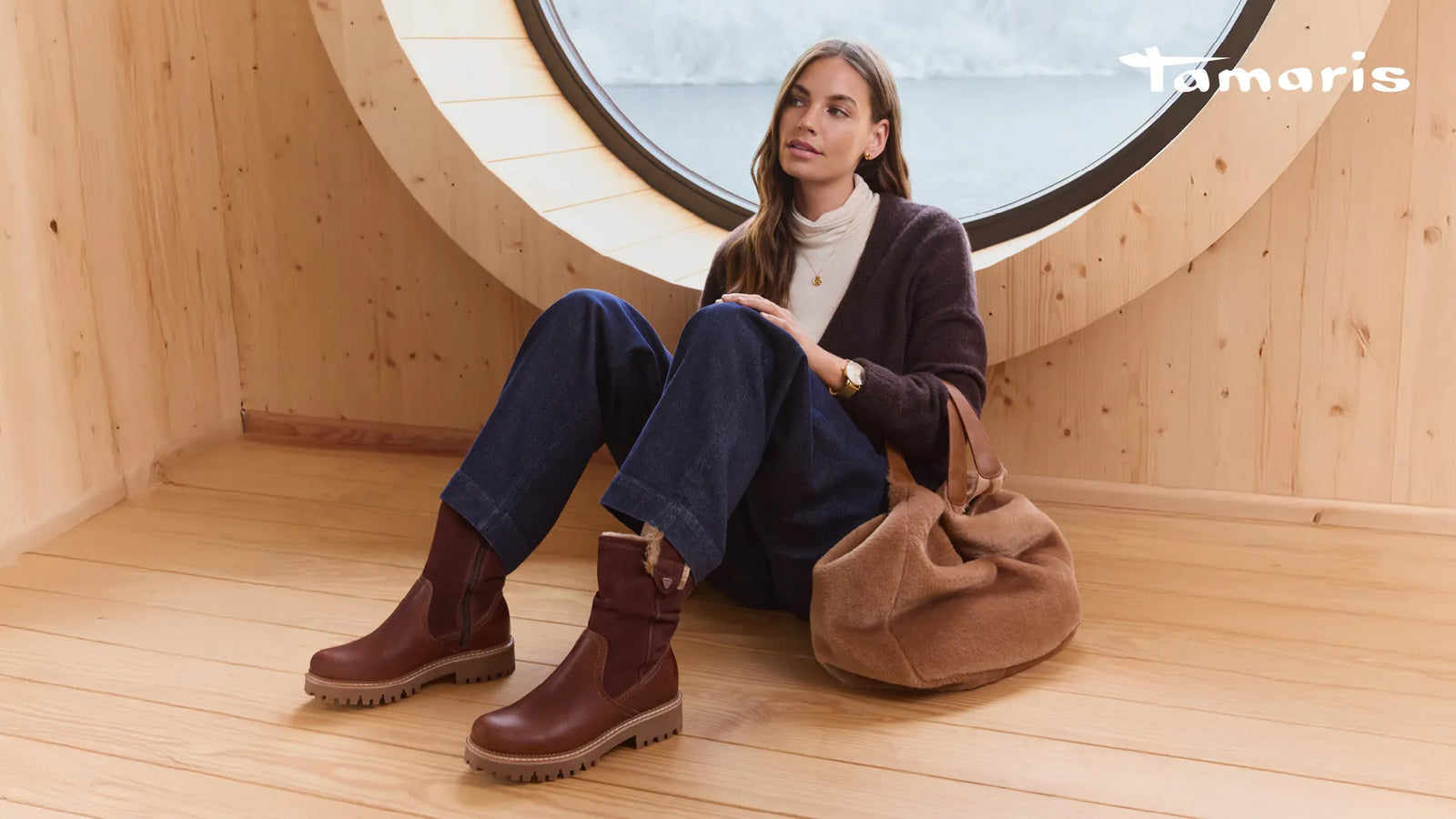 Woman Sitting down wearing Tamaris Brown Boots