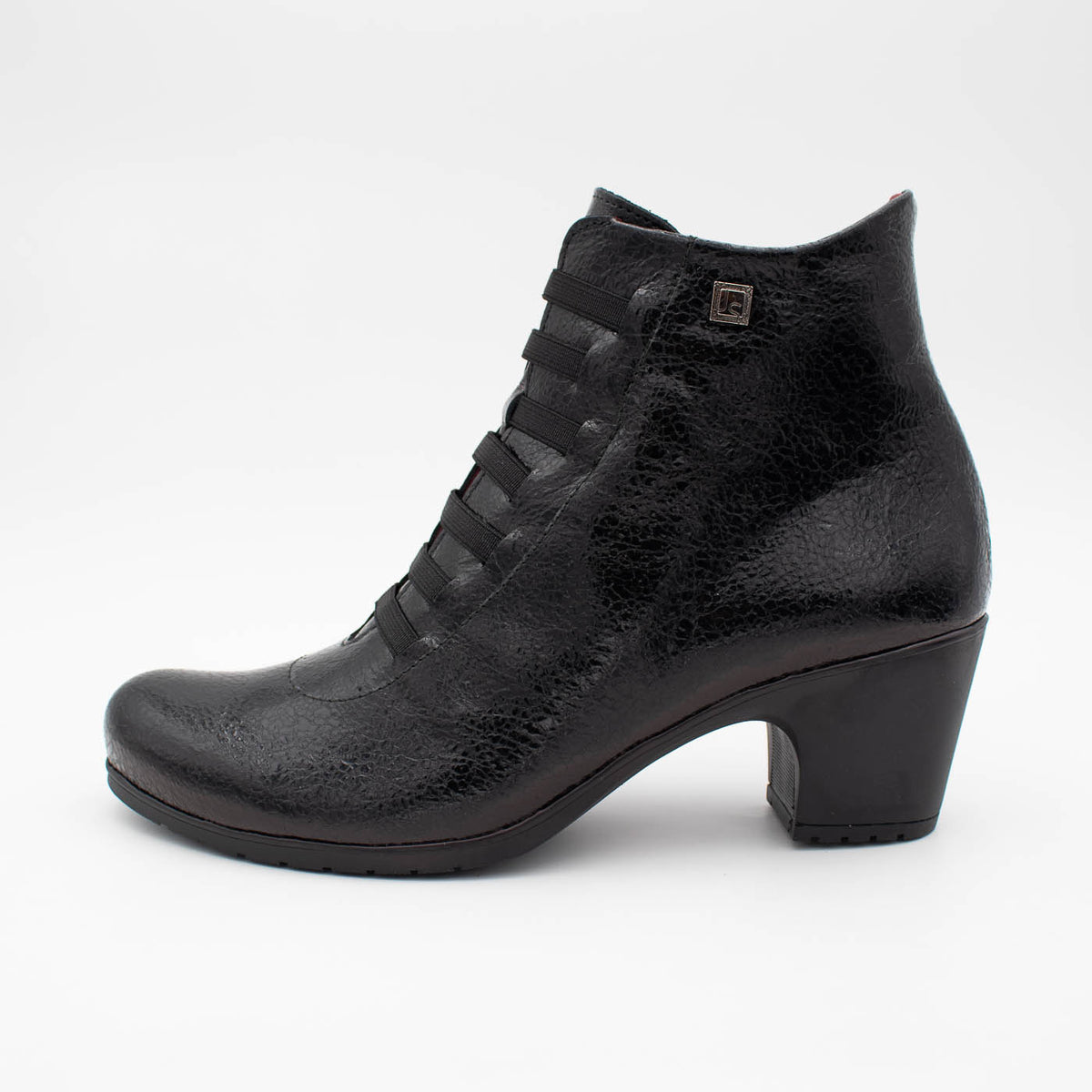 Classic profile of Jose Saenz black ankle boot.