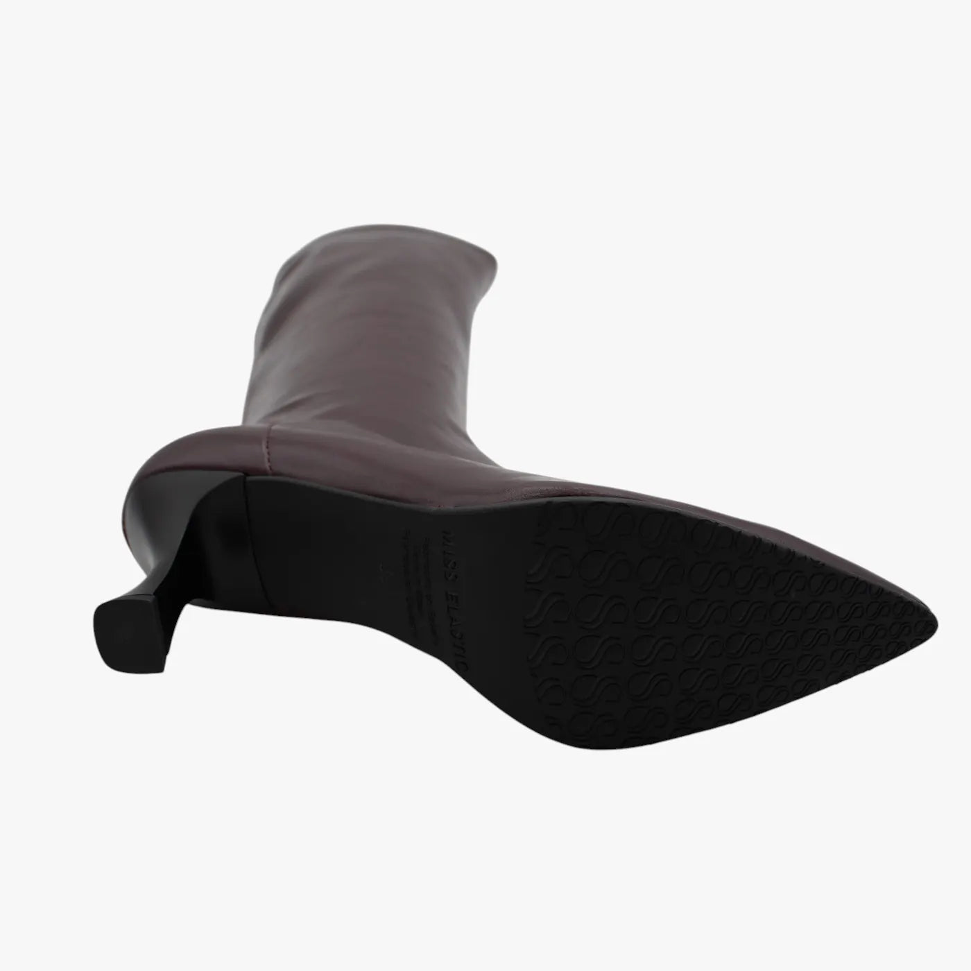 Black treaded outsole of the Miss Elastic Zeta burgundy knee high boot.