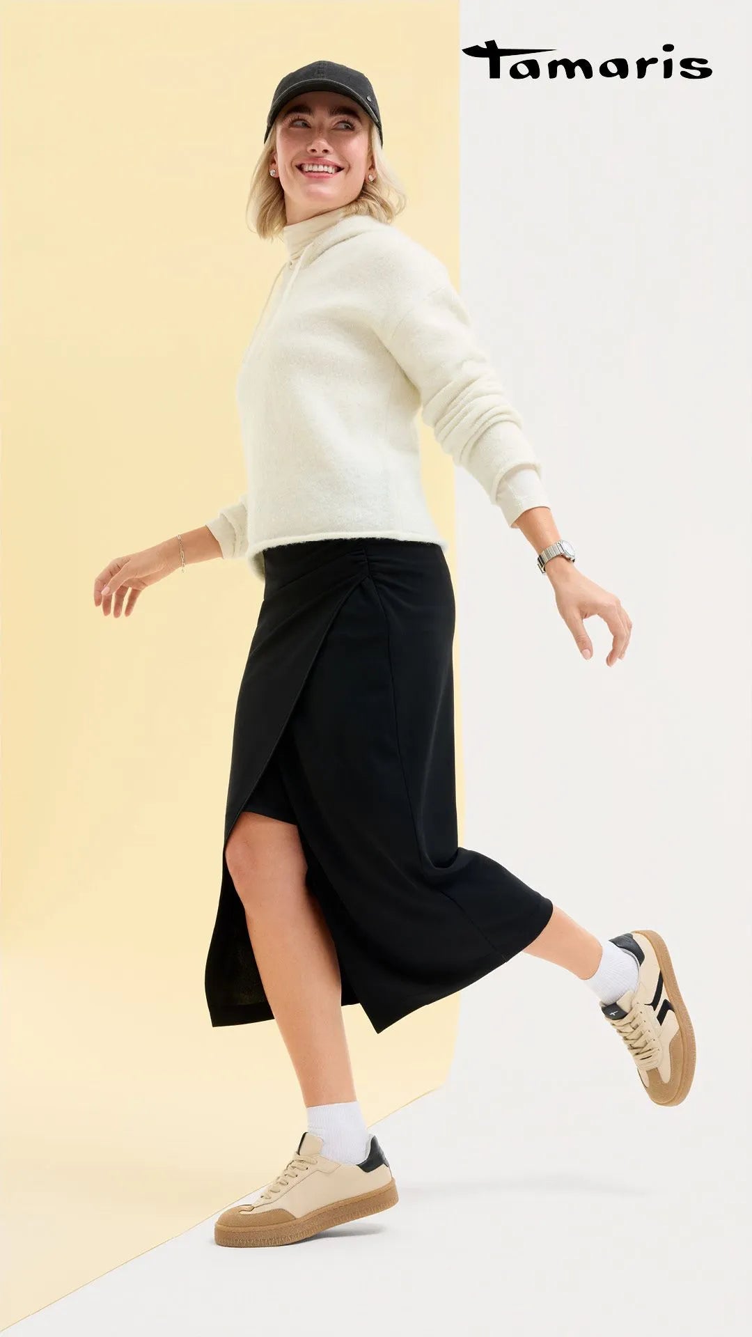 Woman wearing beige trainers with a gum sole from Tamaris