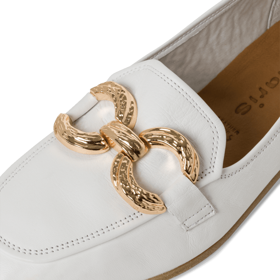 Closeup showcasing the front elegance of Tamaris White Loafers.