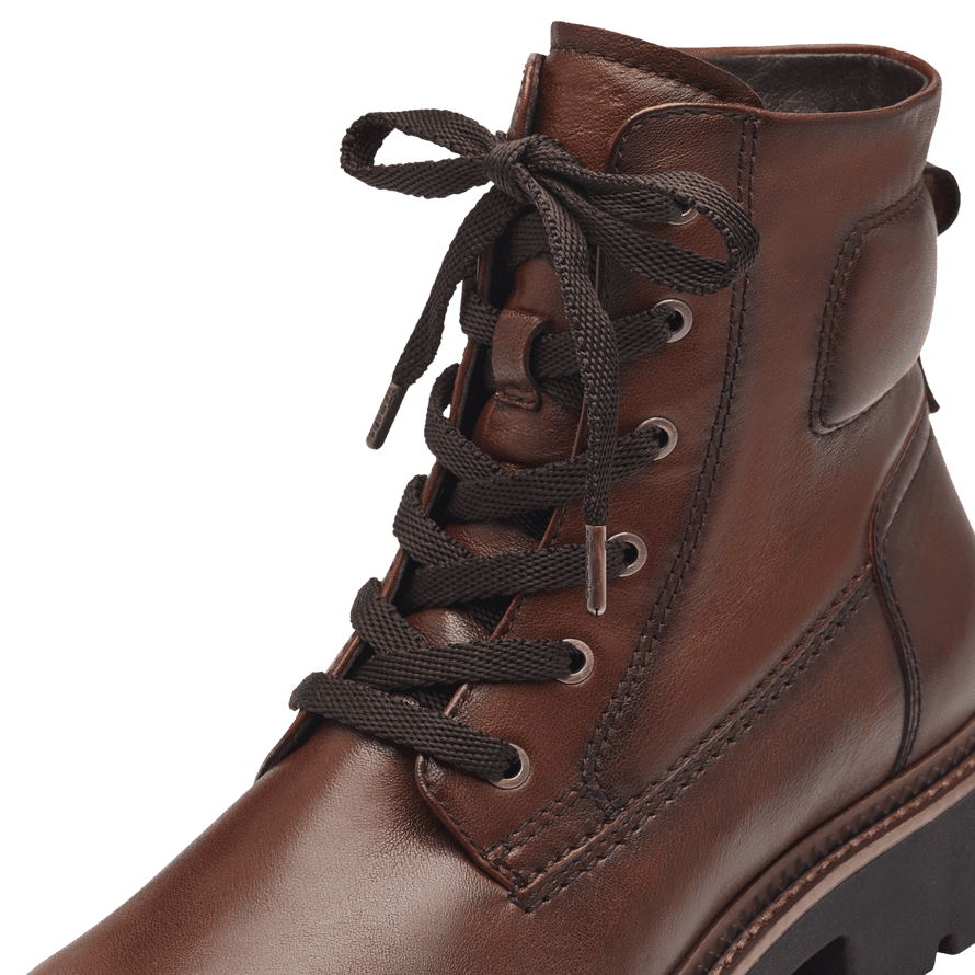 Closeup view of the side and heel of Tamaris leather brown lace up boot.