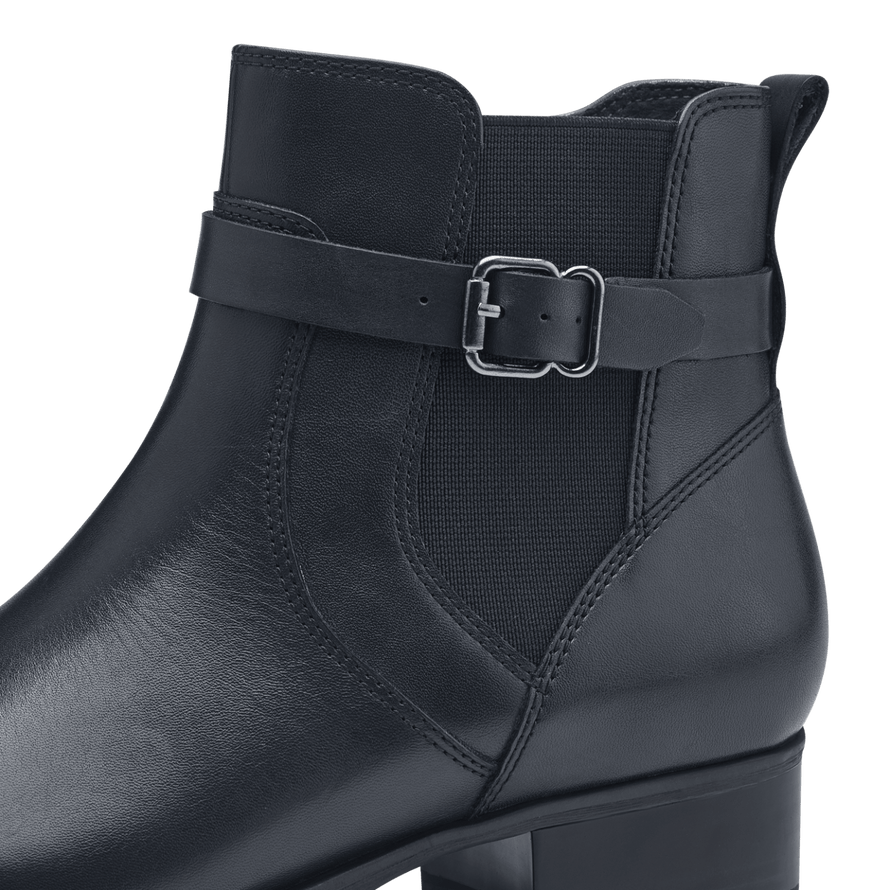Closeup view of the side and heel of Tamaris navy leather ankle boot.
