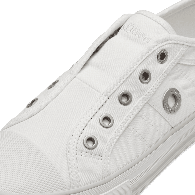 Front view of white canvas flat runner shoes showcasing the breathable canvas upper and elastic strap.
