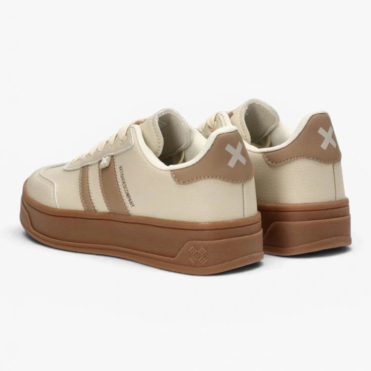 Beige and brown sneakers on a white background