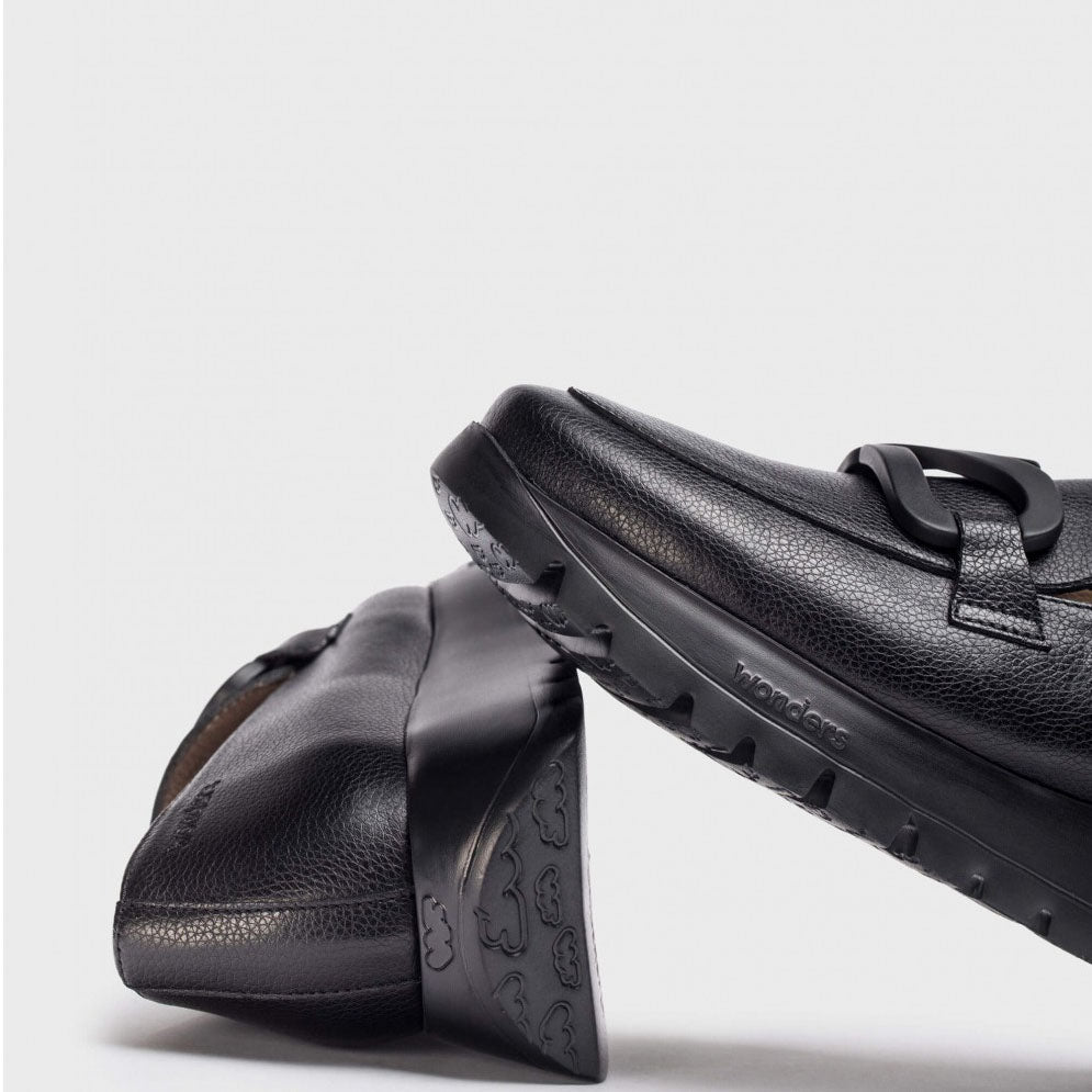 Front view of Wonders black leather loafer with wedge sole.