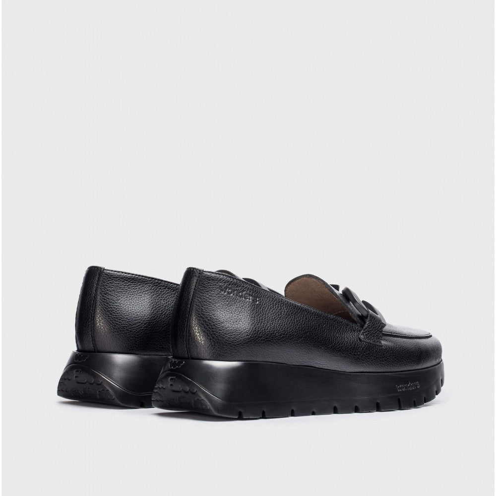 Rear view of Wonders black leather loafers.