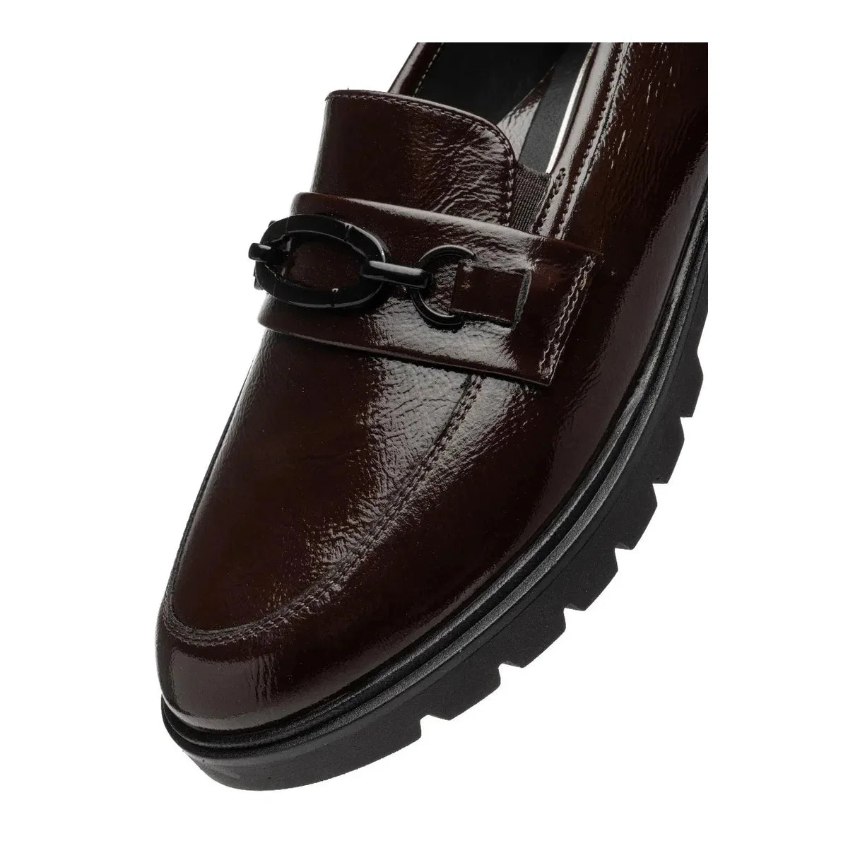 Close-up of the black chain ornament and stitched apron on the Ara Cambridge merlot patent loafer.