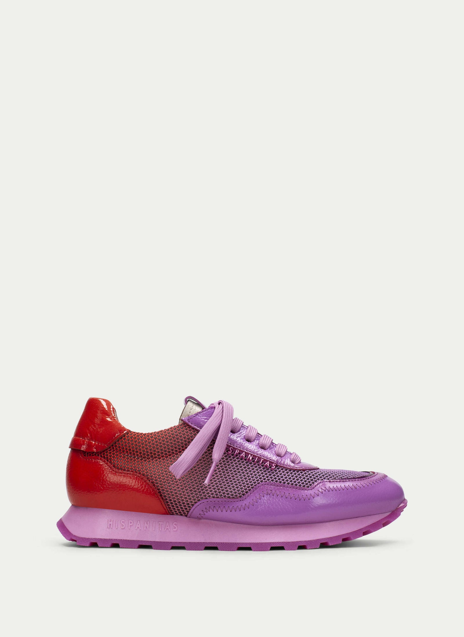     Vibrant red to purple gradient on Hispanitas Luxury Sneaker.