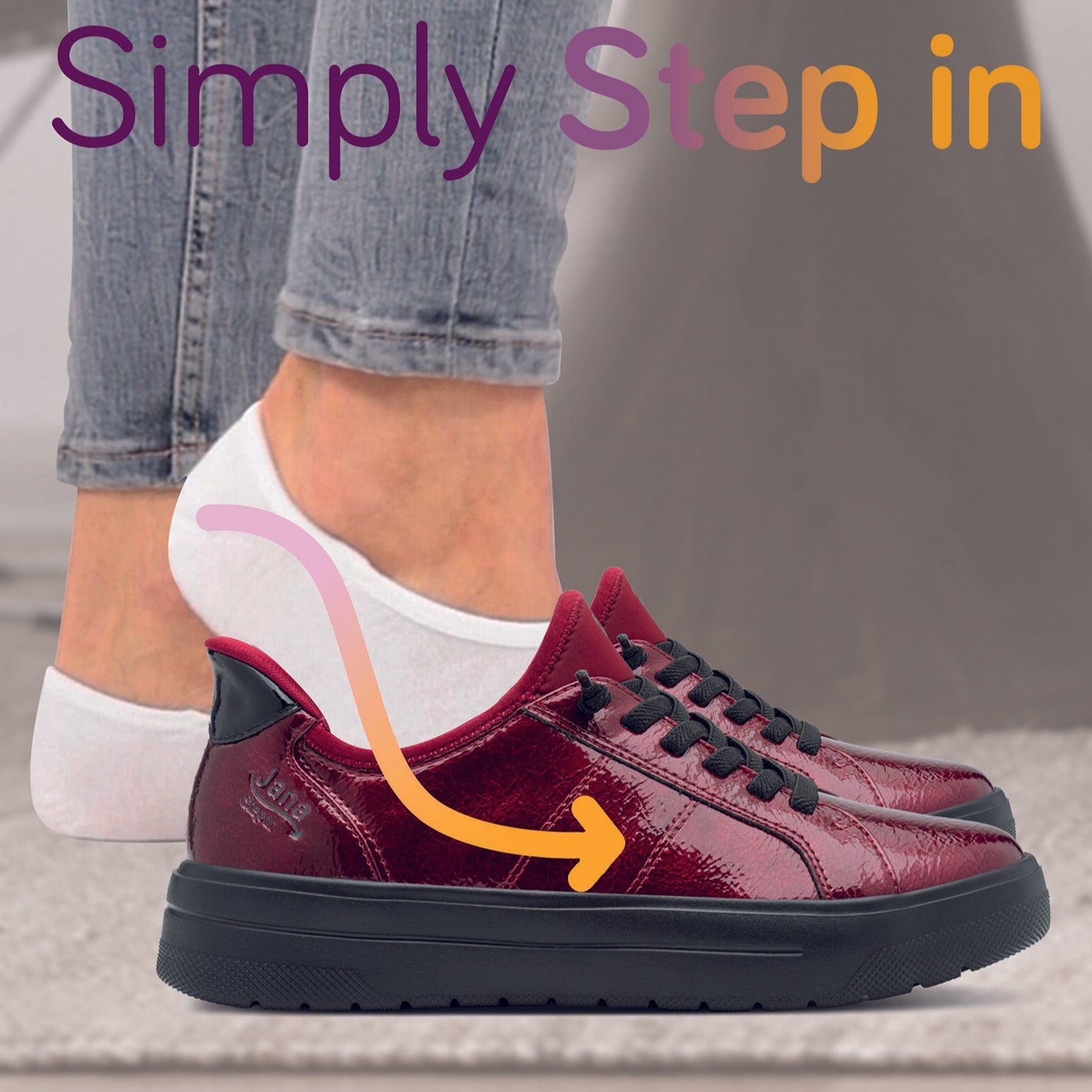 Purple sneaker being worn with text 'Simply Step In' on a blurred background