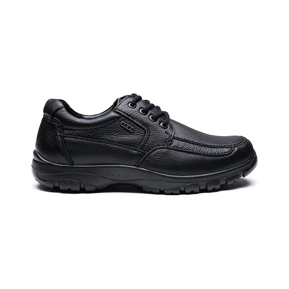 Outer side of the G-Comfort A-7825 black leather shoe, showing the TEX badge and treaded sole.