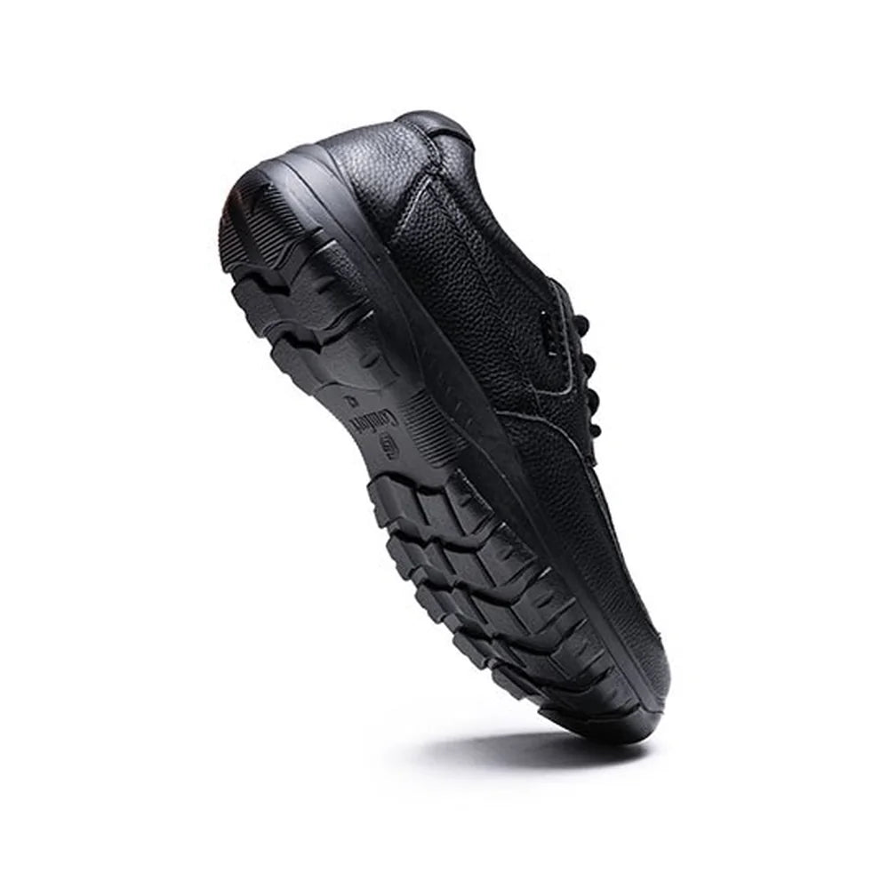 G-Comfort A-7825 black lace-up shoe tilted to show the treaded PU outsole.