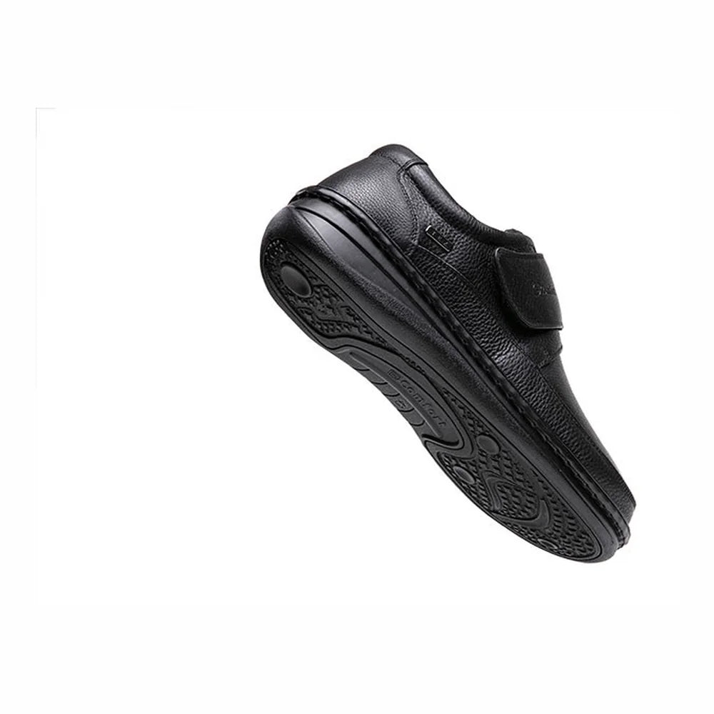 G-Comfort P-3708 black strap shoe tilted to show the outsole and heel.