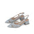 Angled view of the pair of silver block heel sandals showcasing diamante detailing.