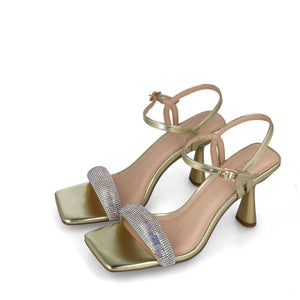 Angled view of a pair of Menbur's Dazzling Gold Square Toe Sandals.